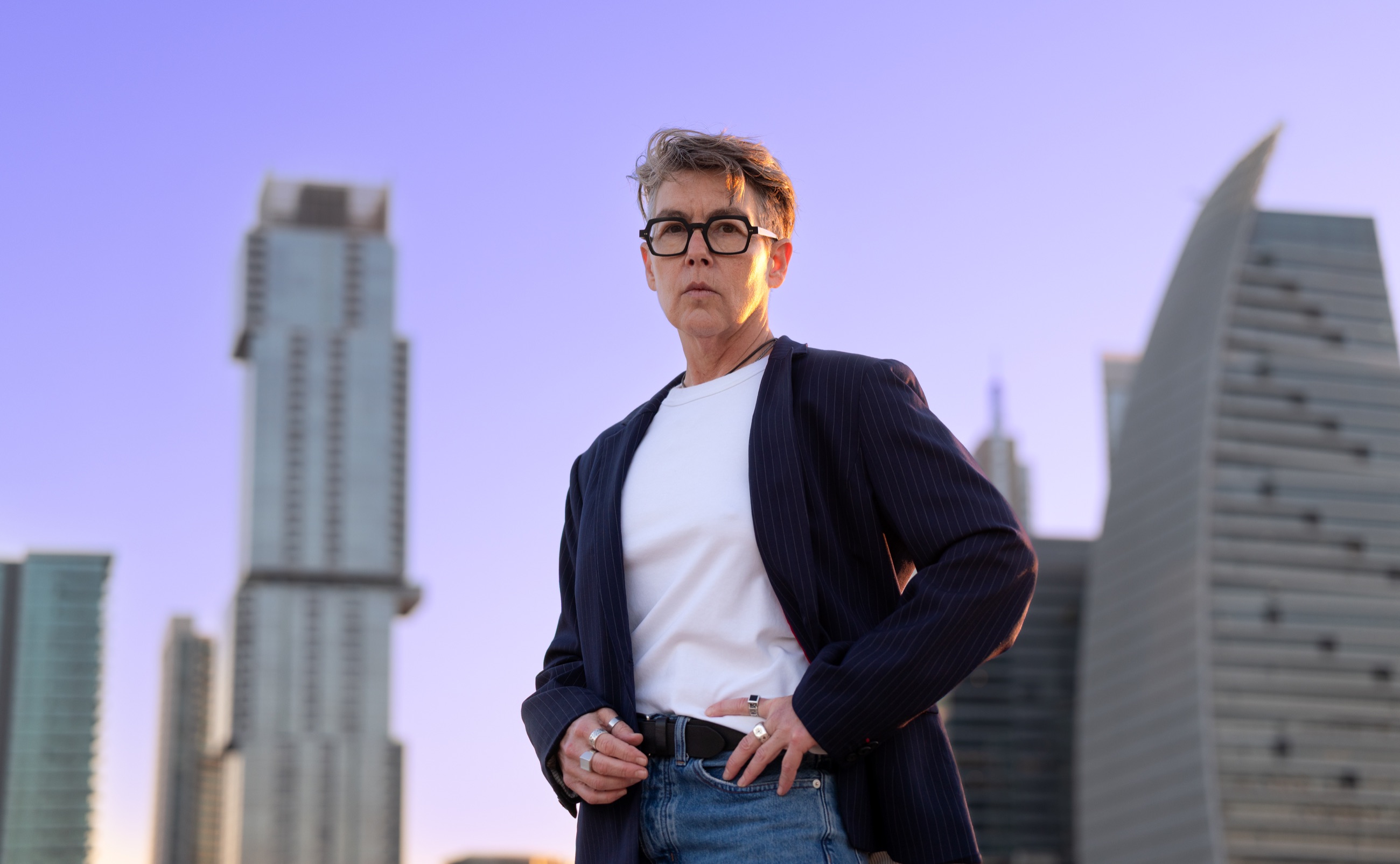 Lenore Shefman, founder of Cyclistlaw, in front of the Austin skyline
